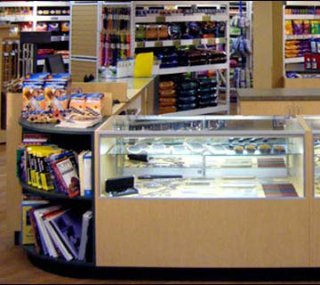 Four Sided Island Retail Counter This style counter is made up using a combination of wood counter pieces and display showcases. Thecounter is great for gift shops, jewelry store or any location big enough to place a large counter in the middle of the space.