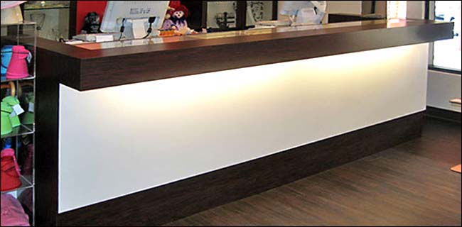 Mahogany & White Dual Station Ledge Front Counter with Under Counter Lighting This modern style counter can be made in any size & color allowing us to match your store concept or theme.