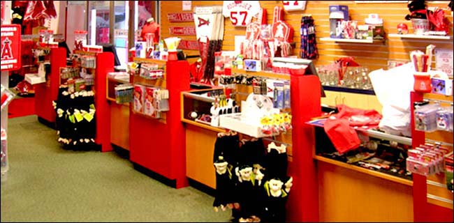 Red & Pear Laminate Arena Checkout Counter This style counter is designed for high traffic locations when it is critical to catch the customers attention with last minute items but still keep the line moving.