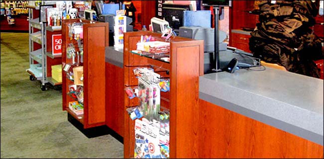 Cherry & Grey Laminate Multi Station Counter with Slatwall POP Display Front The Slatwall Point of Purchase Front on this counter allows the store owner to generate sales of last minute items right at the counter.