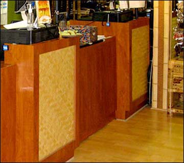 Cherry Laminate with Thatched Bamboo Inlayed Front The inlayed front panel allows the client to create the connection to the contour and concept or theme of the store. Many colors and Materials are available for the design.