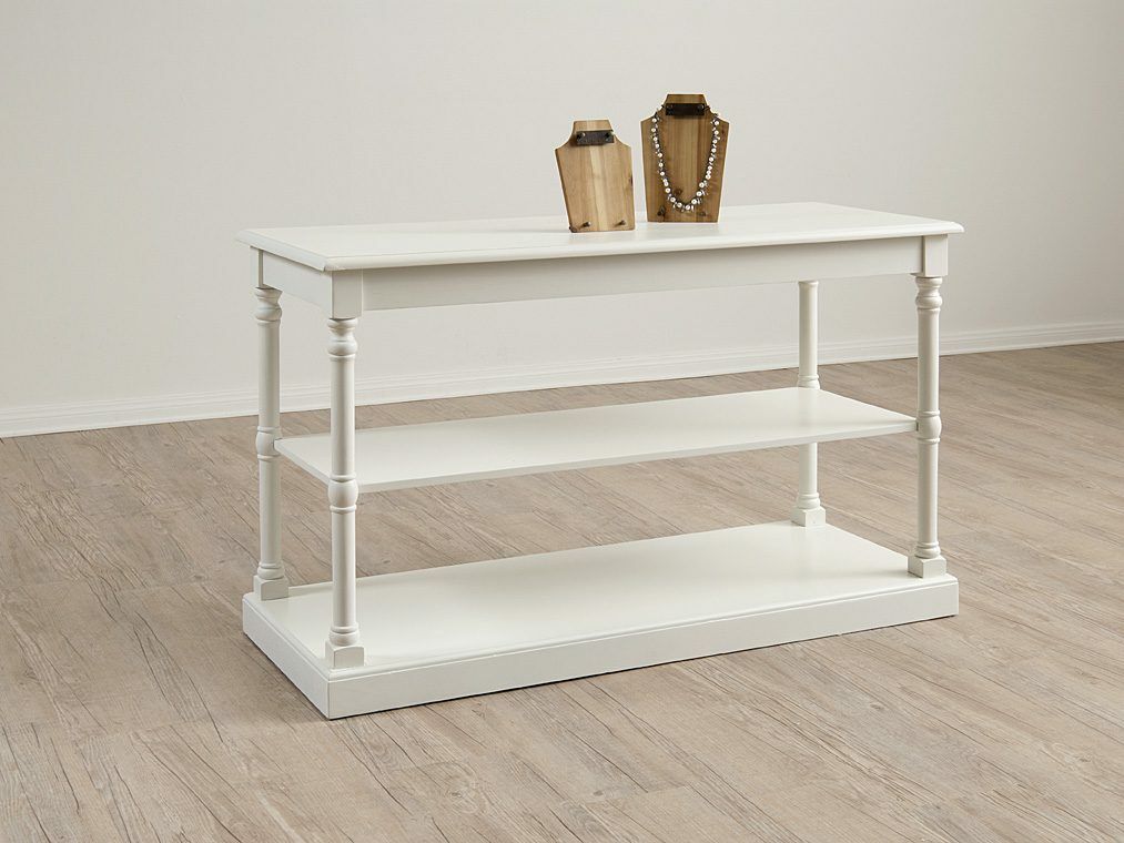 The three-tiered Draper’s table is constructed with strong wood and has a 3 tiered structure provides an excellent storage area for all kinds of materials such as linens or office supplies without taking up too much space.  Size: 60" L x 24" D x 36" H. 