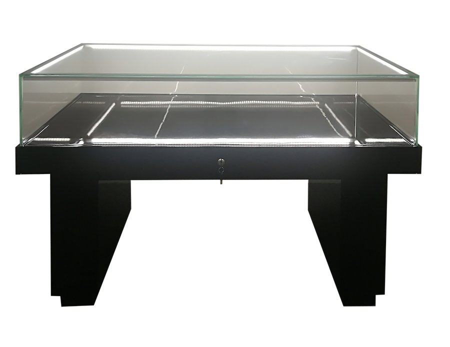 Black Jewelry/Museum Sit Down Display Case. Features: Pull Out Tray with Lock, Tempered Glass Top and Sides- 3/8"T, Led Lighting Dimensions: 58 1/2"L X 23 1/2"D X 37 ½.  