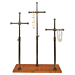 Pipeline Triple Accessory Merchandiser features three individual uprights that can be adjusted from 15½"H to 27"H. The crossbar is 8"W and the wood tone base with a stained cherry finish measures 20"W x 8"D x¾" thick.
