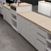 White Contemporary 48" Cash Wrap Counter in use